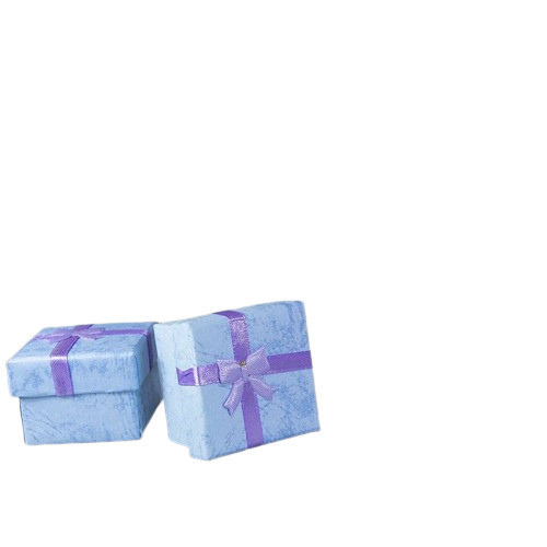 Niebieskie pudełko o średnicy 6 cm z fioletową kokardką