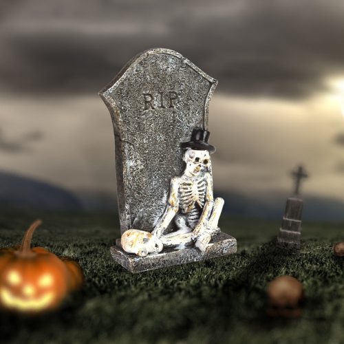 Skeletons at the tombstone