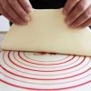 Silicone stretching sheet, silicone stretching board, silicone kneading board