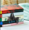 Resin book holder in the shape of a witch's hand, bookmark