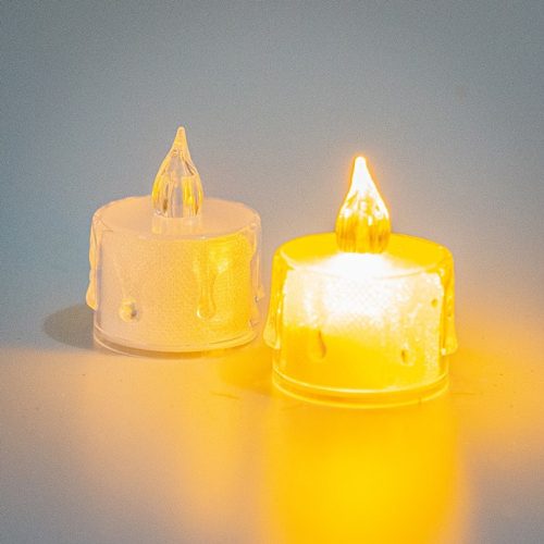 Transparent candle with wax drops