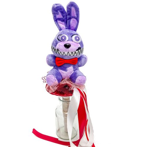 A burgundy bouquet with a bunny figure